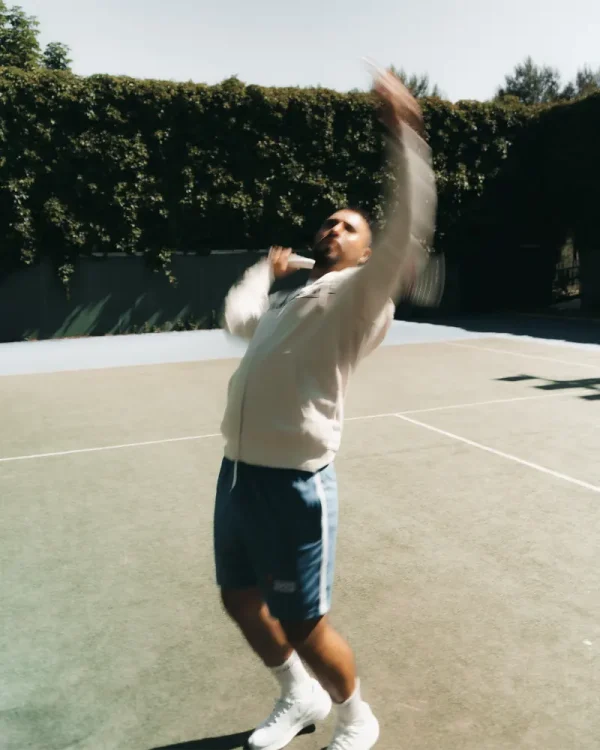 tennis-serve-model TENNIS ZIP HOODIE CREAM - ALWAYS PUSHING HARDER